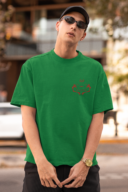 First front view of a male model wearing a forest green oversized t-shirt featuring Ryomen Sukuna with the text "I'm Sakuna."