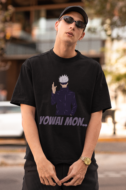 First front view of a male model wearing a black oversized t-shirt featuring Gojo Satoru with his fingers crossed and the text "Yowai Mon."