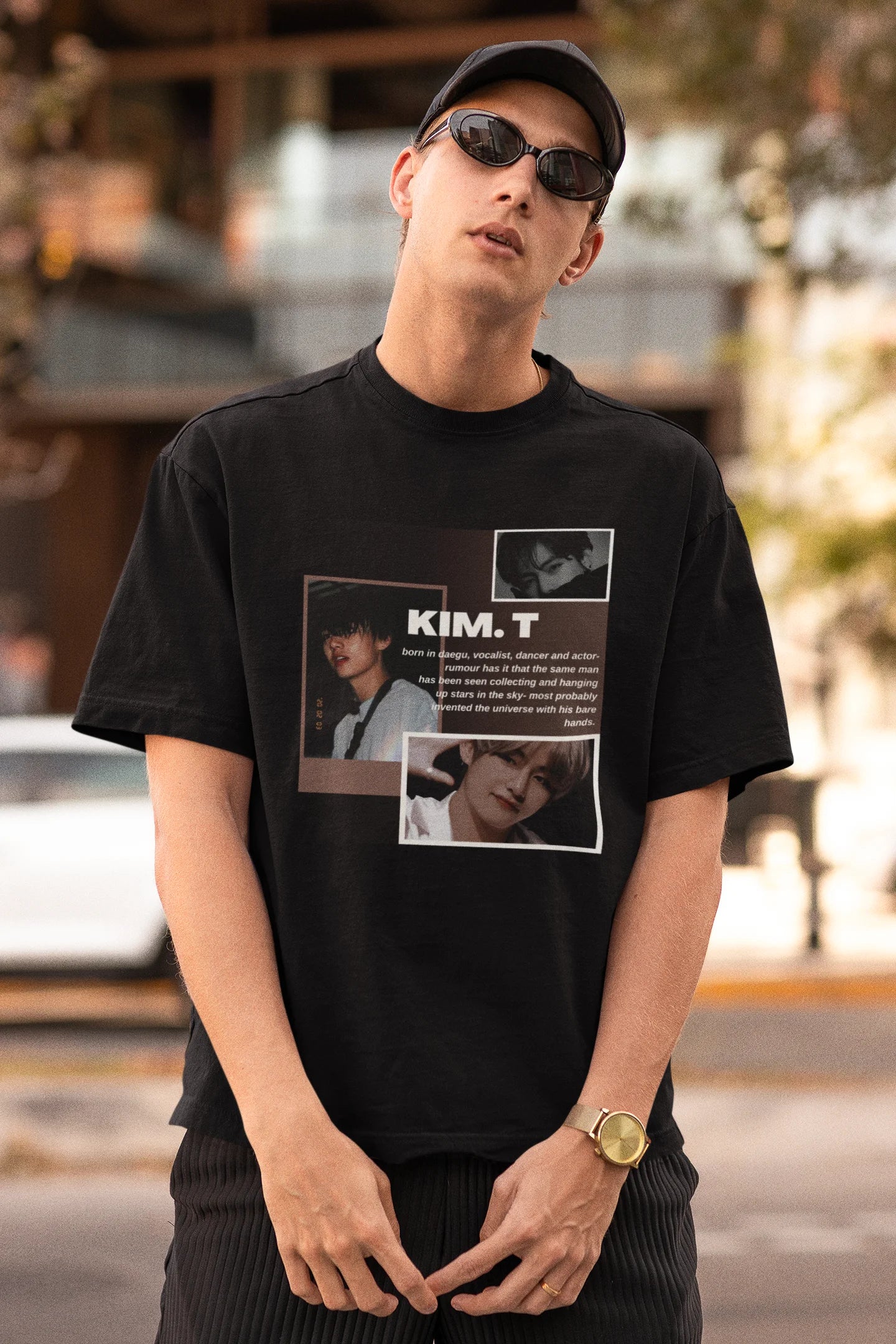 First front view of male model wearing a black oversized t-shirt featuring a bold design inspired by BTS member Kim Taehyung (V). Ideal for BTS fans (ARMY) and K-Pop enthusiasts.