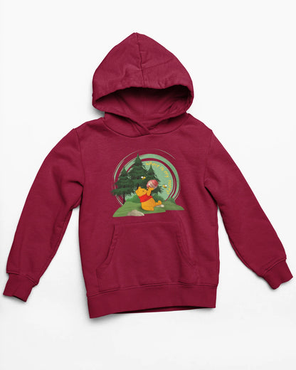 Close up front view of a maroon hoodie with a Winnie the Pooh design, showing the Disney bear eating honey from a jar in a forest.