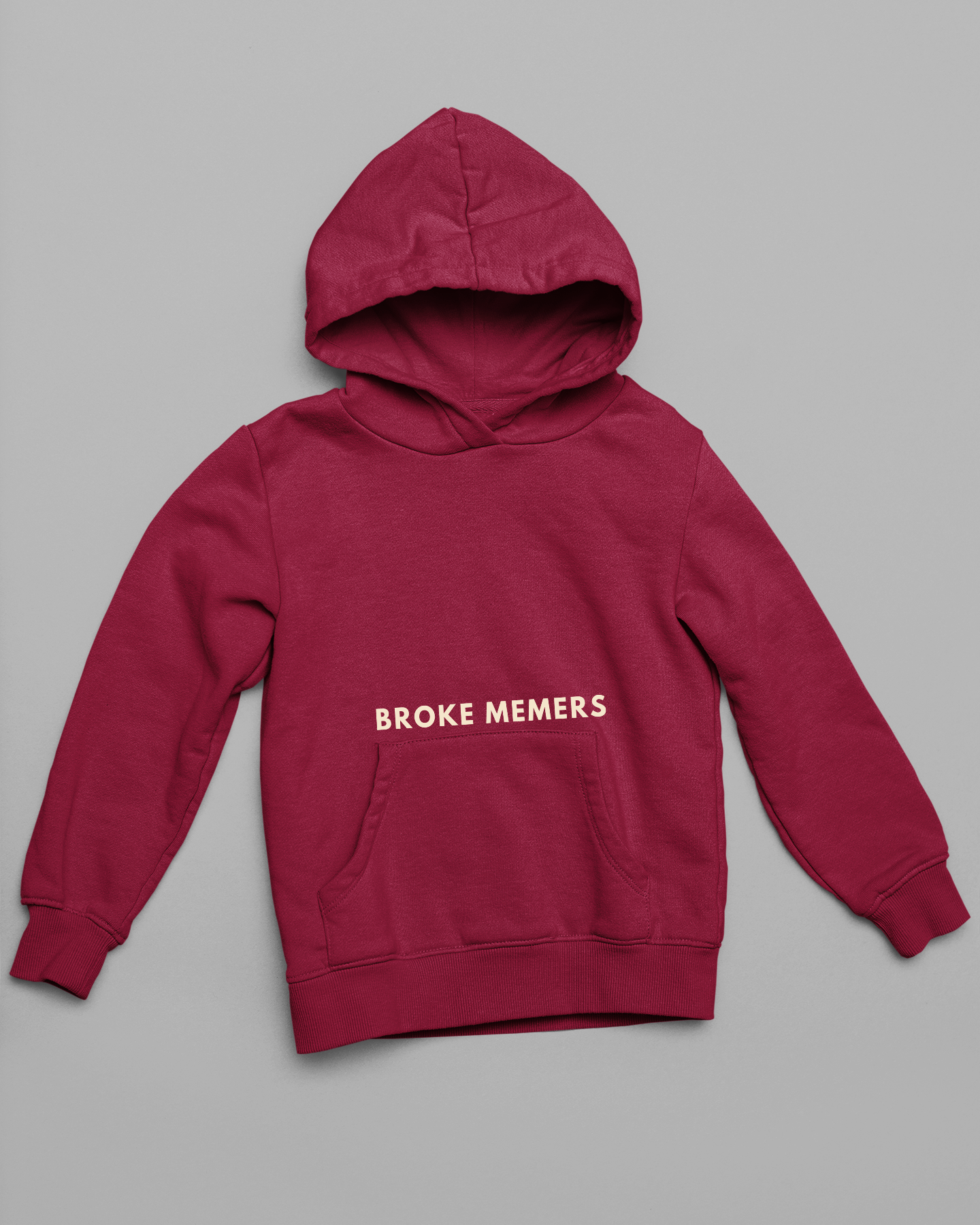 Front view of a maroon hoodie with a Disney design featuring a muscular duck and the text "The Honk."