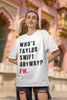 First image of Woman wearing Taylor Swift Red-themed oversized tee, showcasing iconic eras tour merch and Taylor's Version nod