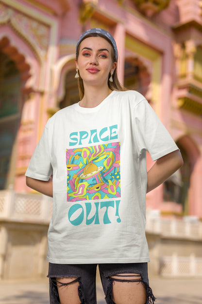 Second image of female model wearing an off white oversized "Spaced Out" t-shirt featuring a vibrant color mashup design that evokes a sense of space exploration, playful aliens, and distant galaxies.