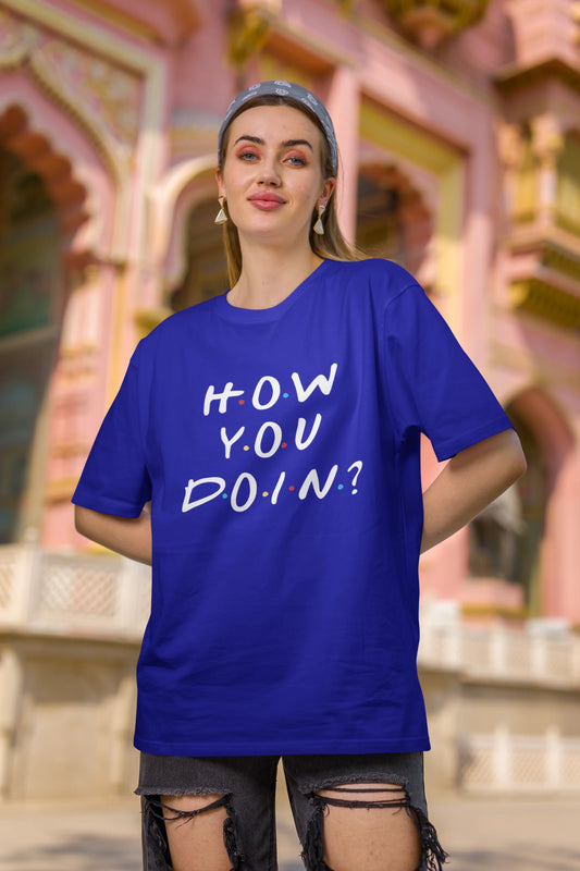 Second image of female model wearing blue oversized t-shirt with F.R.I.E.N.D.S series inspired designs, embodying Joey's famous catchphrase 'How You Doin'?