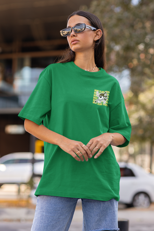 First front view of a female model wearing a forest green oversized t-shirt featuring Usopp from the One Piece anime.