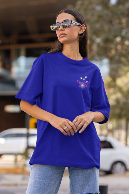 Side view of female model showcasing blue oversized Taylor Swift t-shirts inspired by her "Lover" album (Taylor's Version).