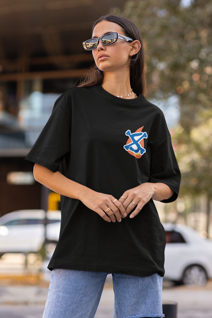 First front view of a female model wearing a black oversized t-shirt featuring Sabo with the text "Flame Emperor."
