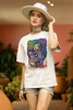 Side view of a female model wearing an off-white oversized t-shirt featuring a psychedelic melting green zombie design, perfect for a trippy, dark aesthetic.