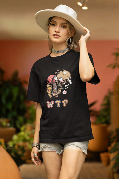 Side view of a female model wearing an black oversized t-shirt featuring a skull enjoying coffee, pizza, and smoking, offering a unique and edgy aesthetic.