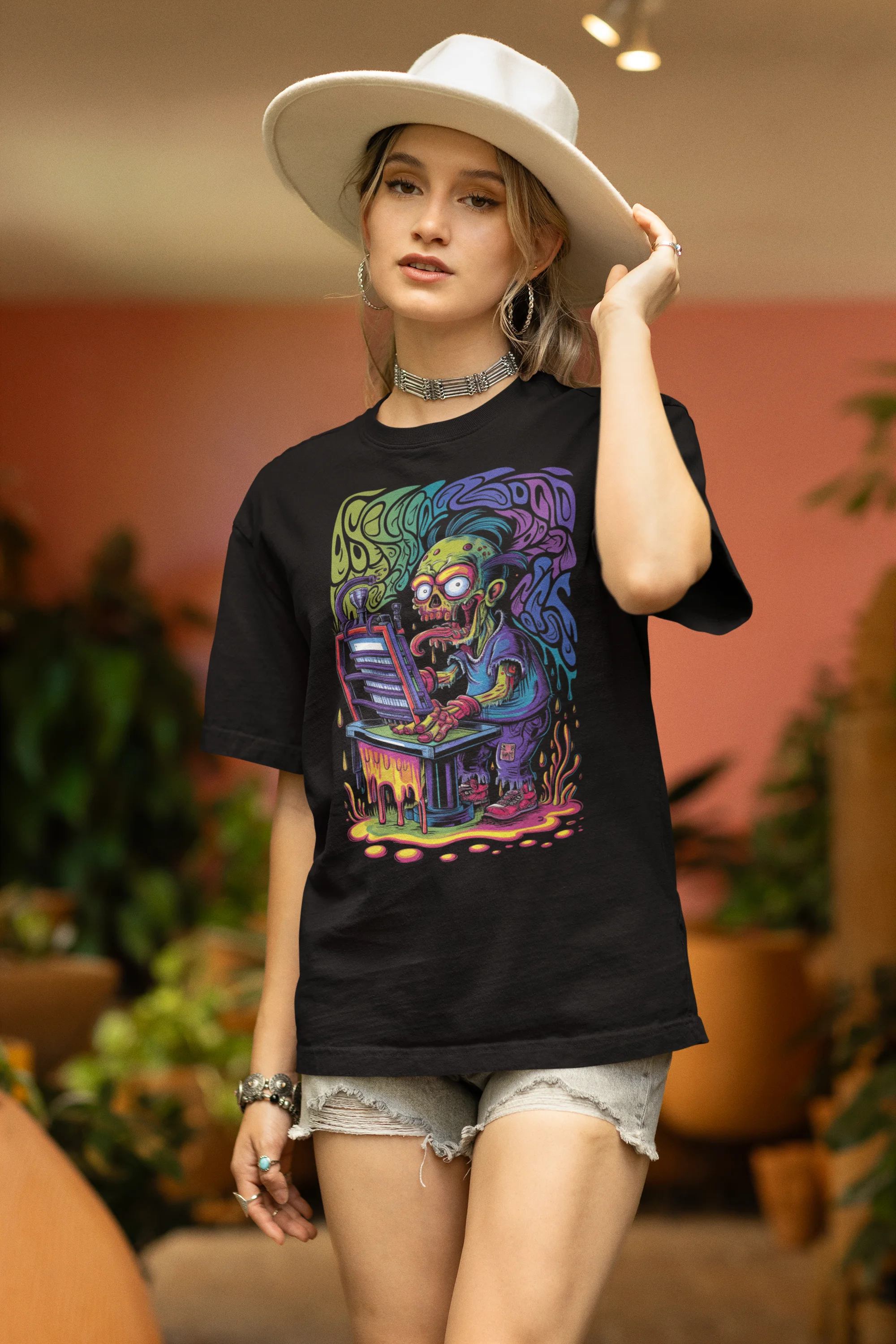 Side view of a female model wearing an black oversized t-shirt featuring a psychedelic melting green zombie design, perfect for a trippy, dark aesthetic.