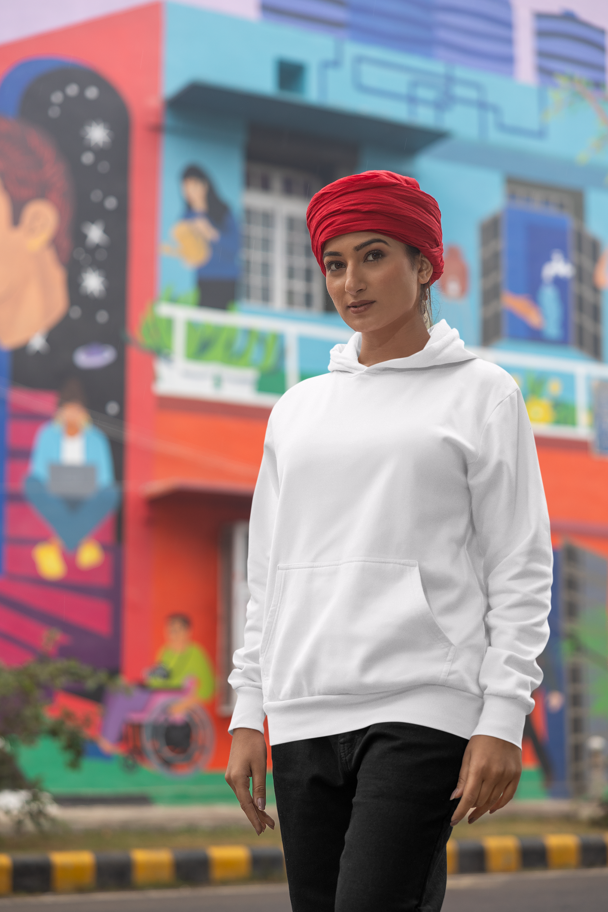 Second front view of a female model wearing a comfortable white hoodie featuring the phrase "Vibe Teri Meri" in a modern font on a portrait of Diljit Singh holding up a sunflower, perfect for expressing your unique style and feeling the rhythm.