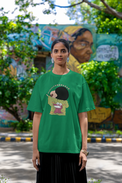 Fourth front view of female model wearing a forest green oversized t-shirt with a design of Shinchan laughing hysterically. Perfect for Shinchan fans who love the character's humor.