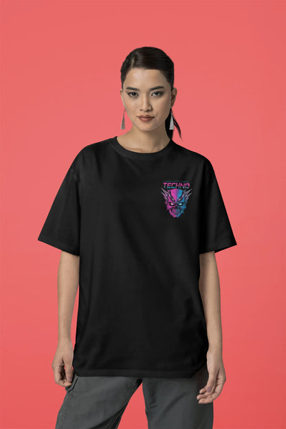Third front view of a female model wearing an black oversized t-shirt with a stylized Techno Skull design, perfect for rave and party vibes.