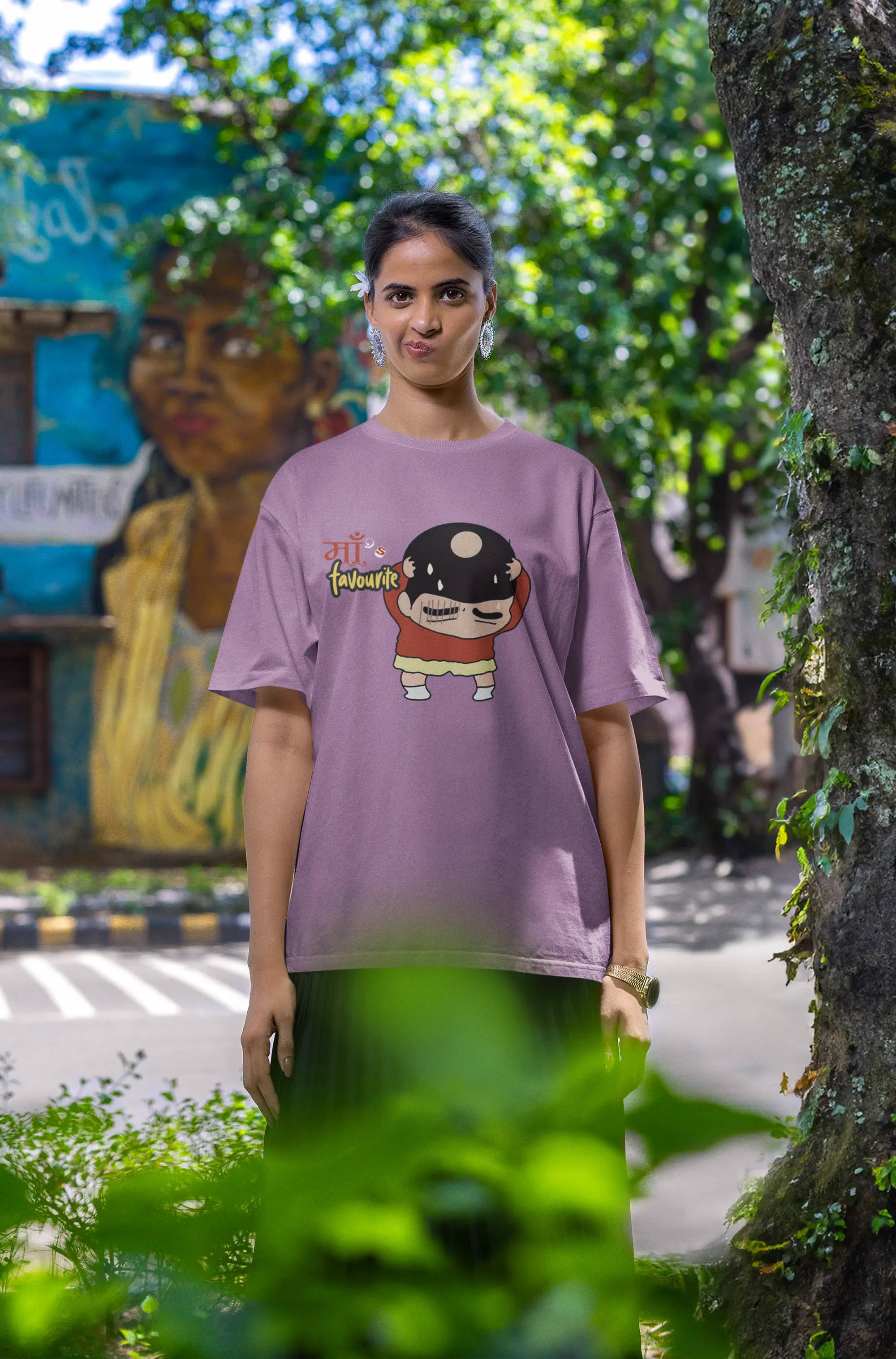 First front view of female model wearing a dirty purple oversized tee featuring Shinchan with a classic bump on his head. A perfect blend of humor and nostalgia for Shinchan fans.