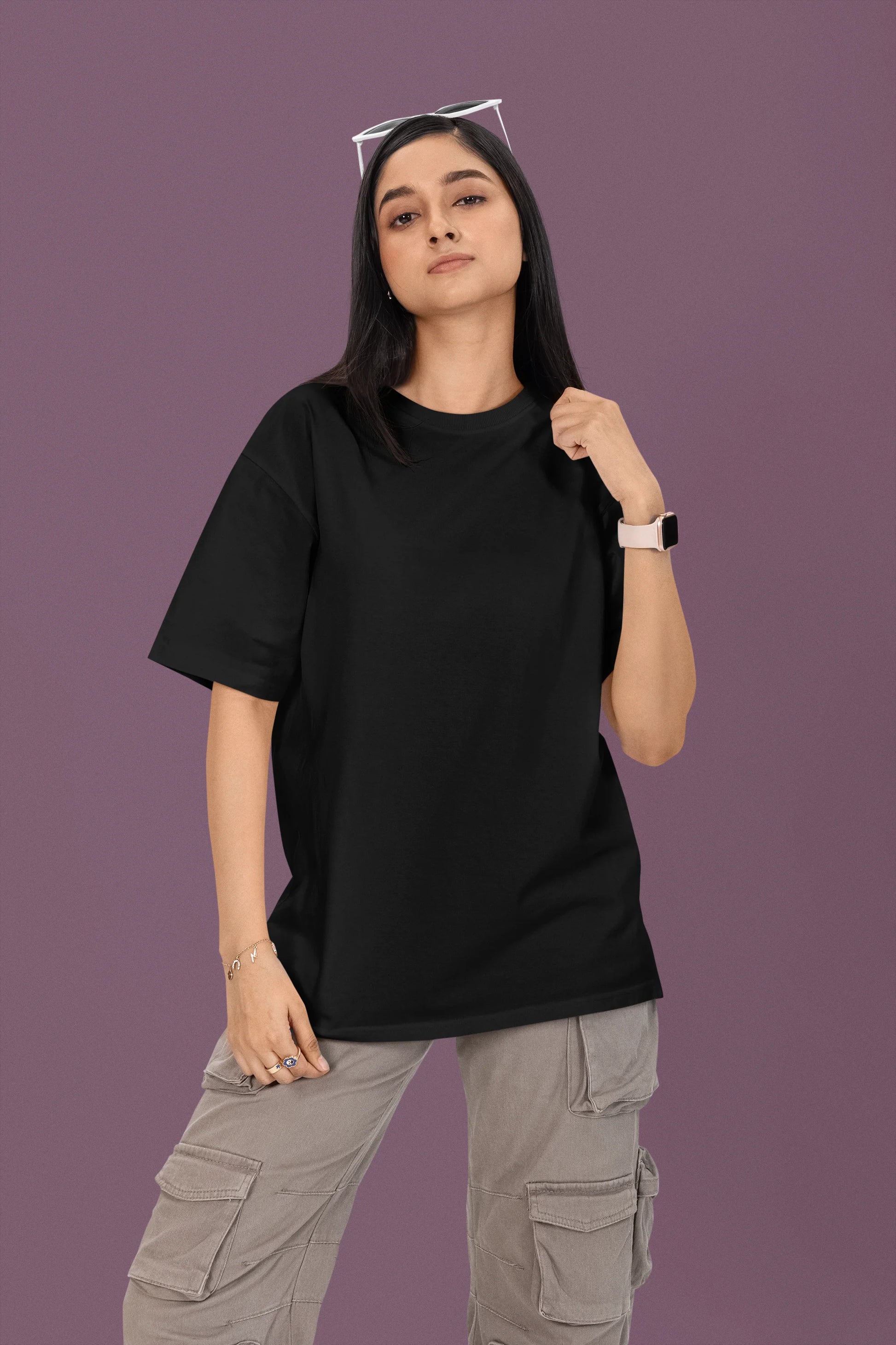 2nd front view of a female model wearing a black oversized t-shirt featuring a couple dancing in the moonlight, inspired by Ed Sheeran's themes of love.