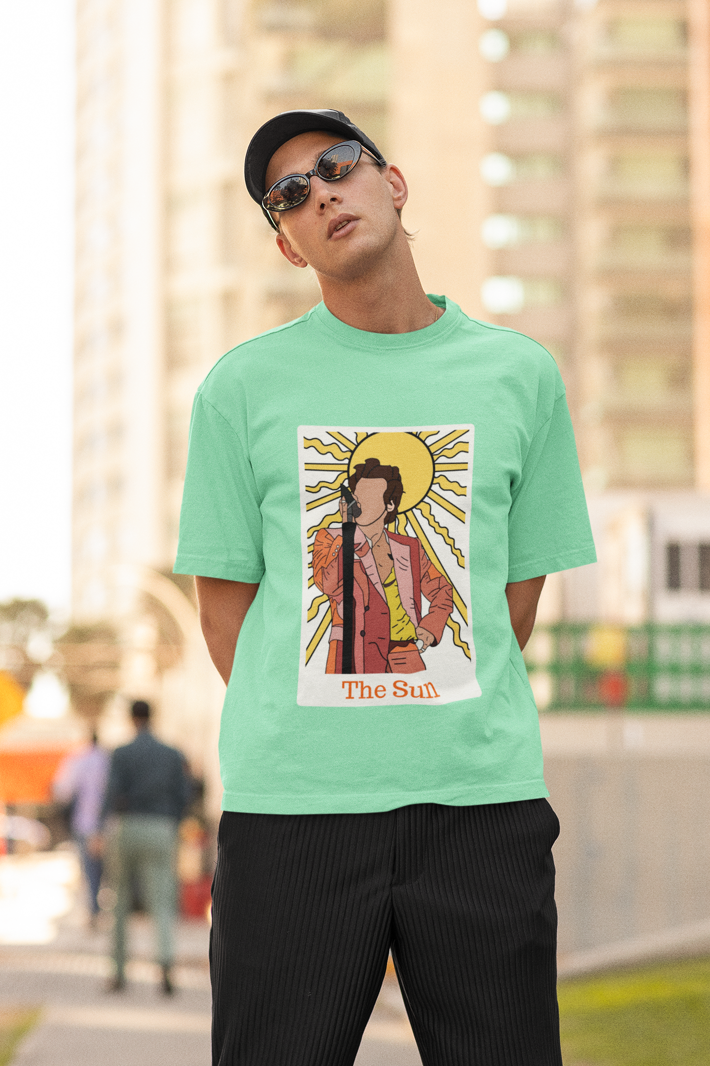 Second Image of man wearing mint green Oversized t-shirt inspired by 'The Sun' - perfect for fans of Harry Styles and One Direction