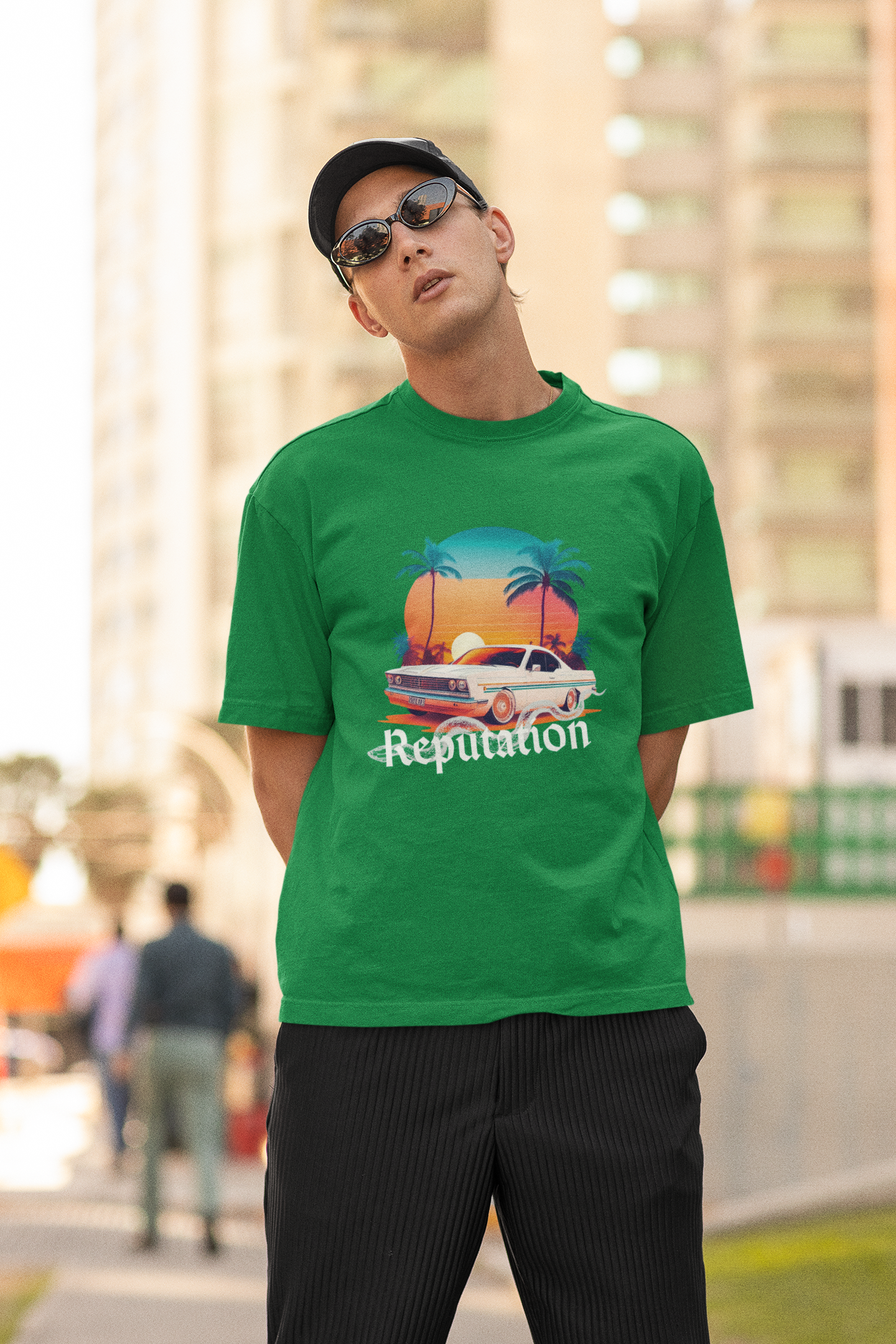 Second image of man wearing green Oversize t-shirt featuring Reputation Taylor's Version design inspired by Taylor Swift's Reputation era