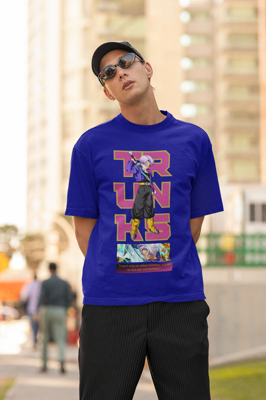 2nd front view of a male model wearing a royal blue oversized t-shirt featuring Trunks from Dragon Ball Z with the text "Trunks."