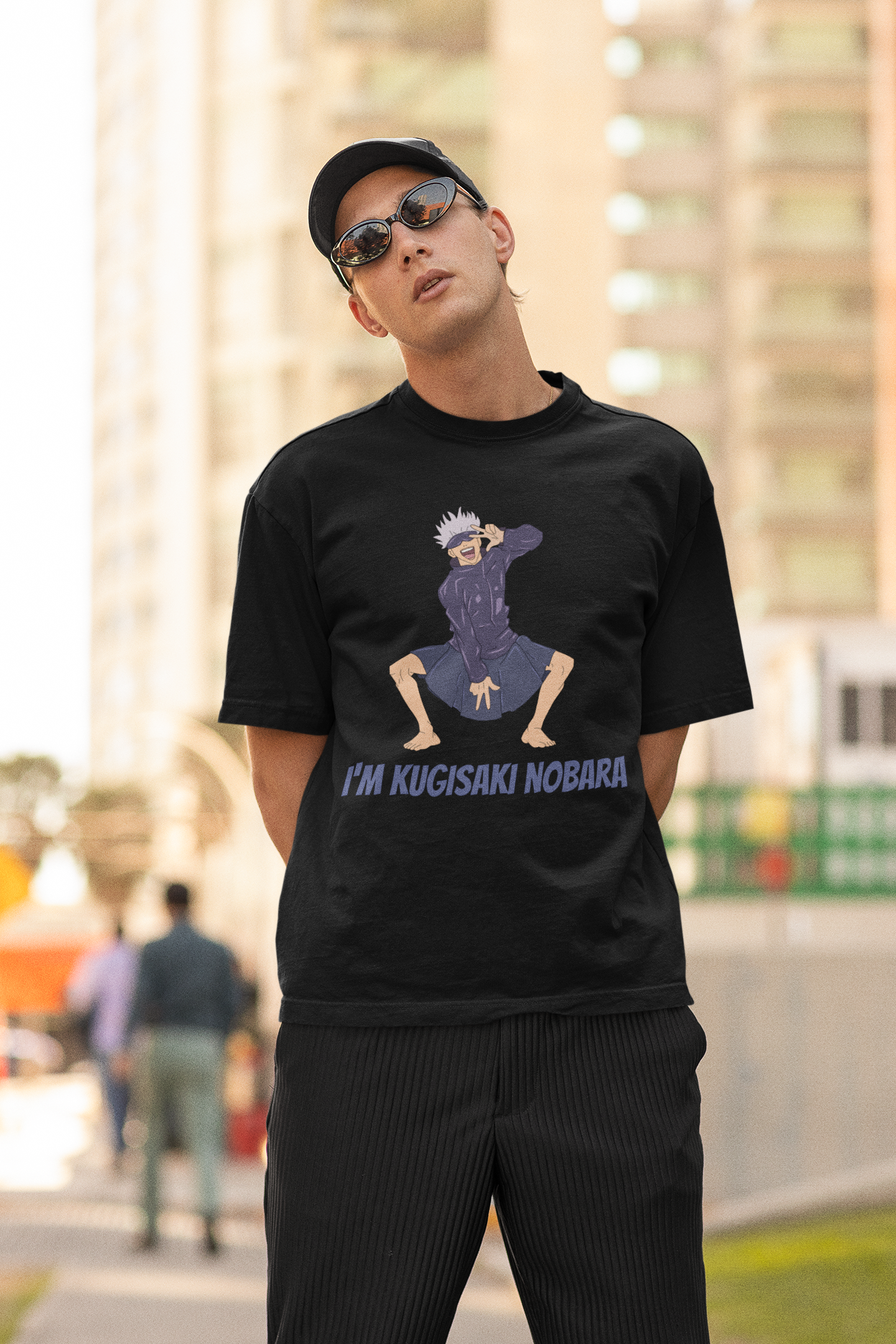 2nd front view of a male model wearing an black oversized t-shirt featuring Satoru Gojo dressed as Nobara Kugisaki.