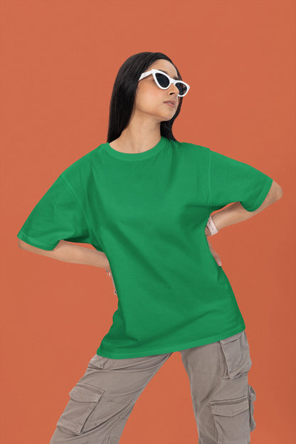 2nd front view of a female model wearing a forest green oversized t-shirt featuring lyrics from Ed Sheeran's song "Perfect" against a night sky design.