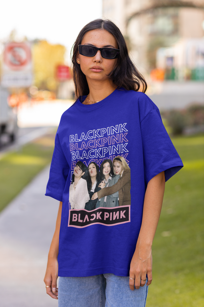 Front view of female model wearing a royal blue oversized t-shirt featuring a stylish design inspired by the K-Pop girl group Blackpink. Ideal for Blinks (Blackpink fans) and K-Pop music enthusiasts.