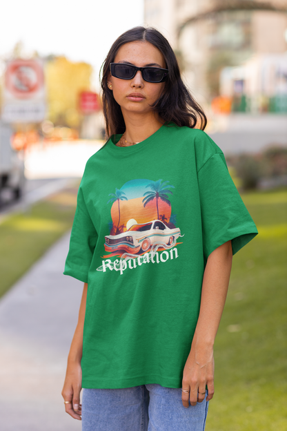 Front view of woman wearing green Oversize t-shirt featuring Reputation Taylor's Version design inspired by Taylor Swift's Reputation era