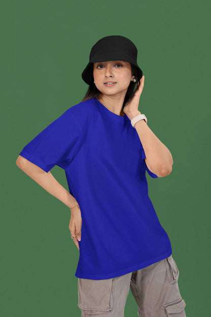 2nd front view of a female model wearing a royal blue oversized t-shirt featuring a couple dancing in the moonlight, inspired by Ed Sheeran's themes of love.