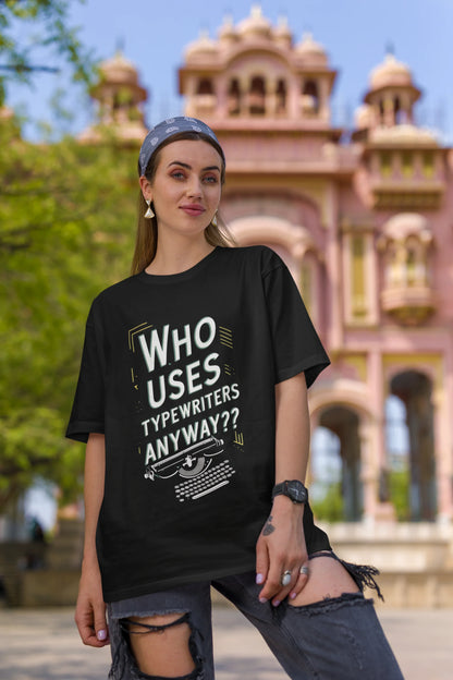 First Image of a woman wearing black Oversize t-shirt featuring TTPD design inspired by Taylor Swift's Eras Tour.