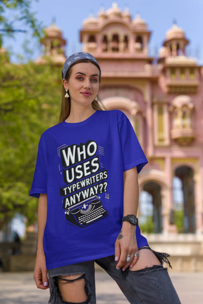 First Image of a woman wearing blue Oversize t-shirt featuring TTPD design inspired by Taylor Swift's Eras Tour.