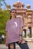 Second image of woman wearing dirty purple coloured Oversized Taylor Swift T-Shirt featuring TTPD design.