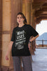 Third Image of a woman wearing black Oversize t-shirt featuring TTPD design inspired by Taylor Swift's Eras Tour.
