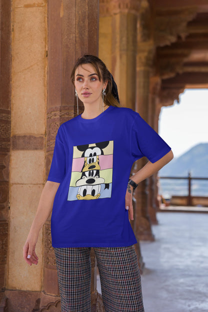 Third image of female Models showcasing blue oversized t-shirt inspired by Mickey Mouse Clubhouse characters: Mickey Mouse, Donald Duck, Goofy, and Minnie Mouse