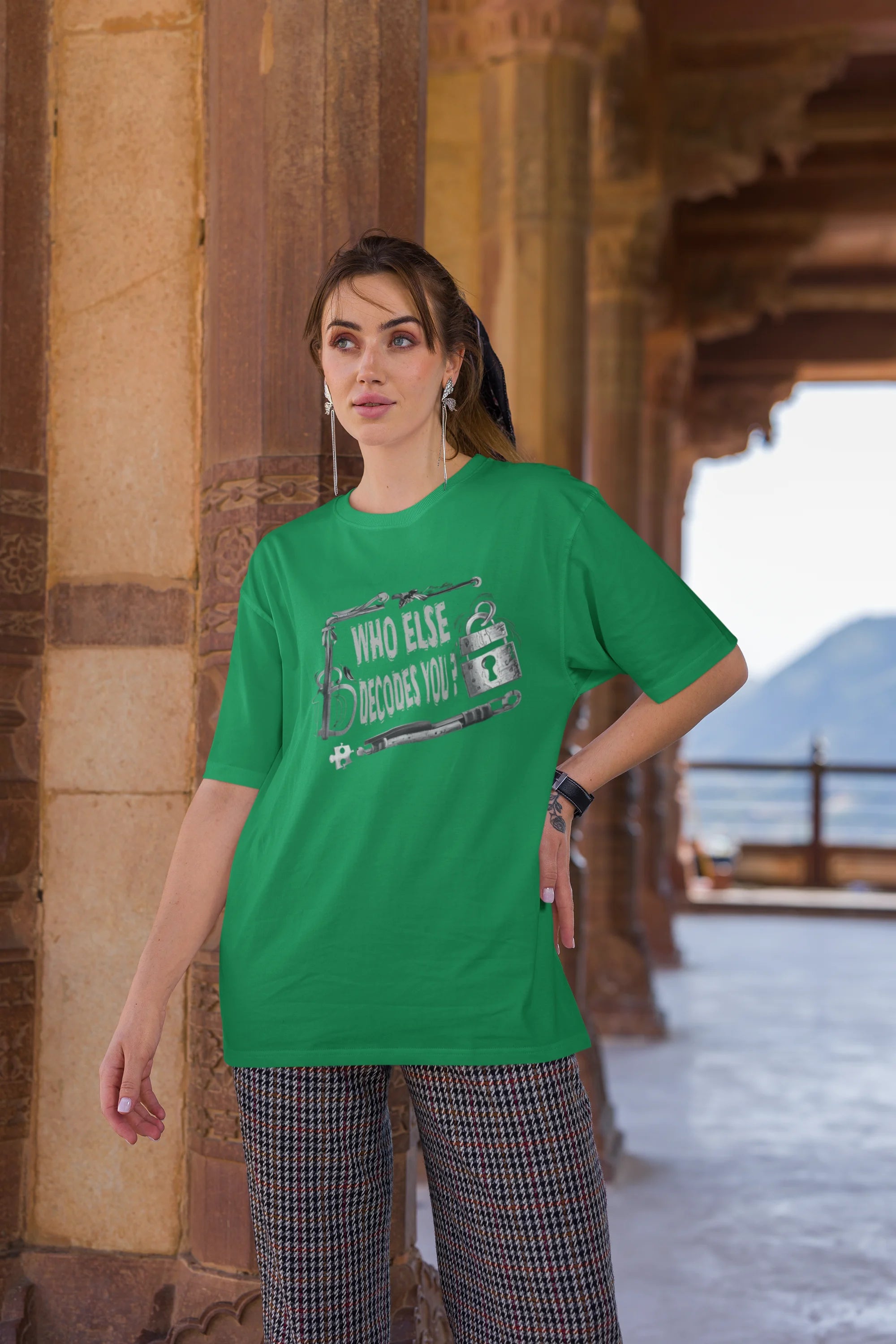 Second image of woman wearing green coloured Oversized Taylor Swift T-Shirt featuring TTPD inspired design.