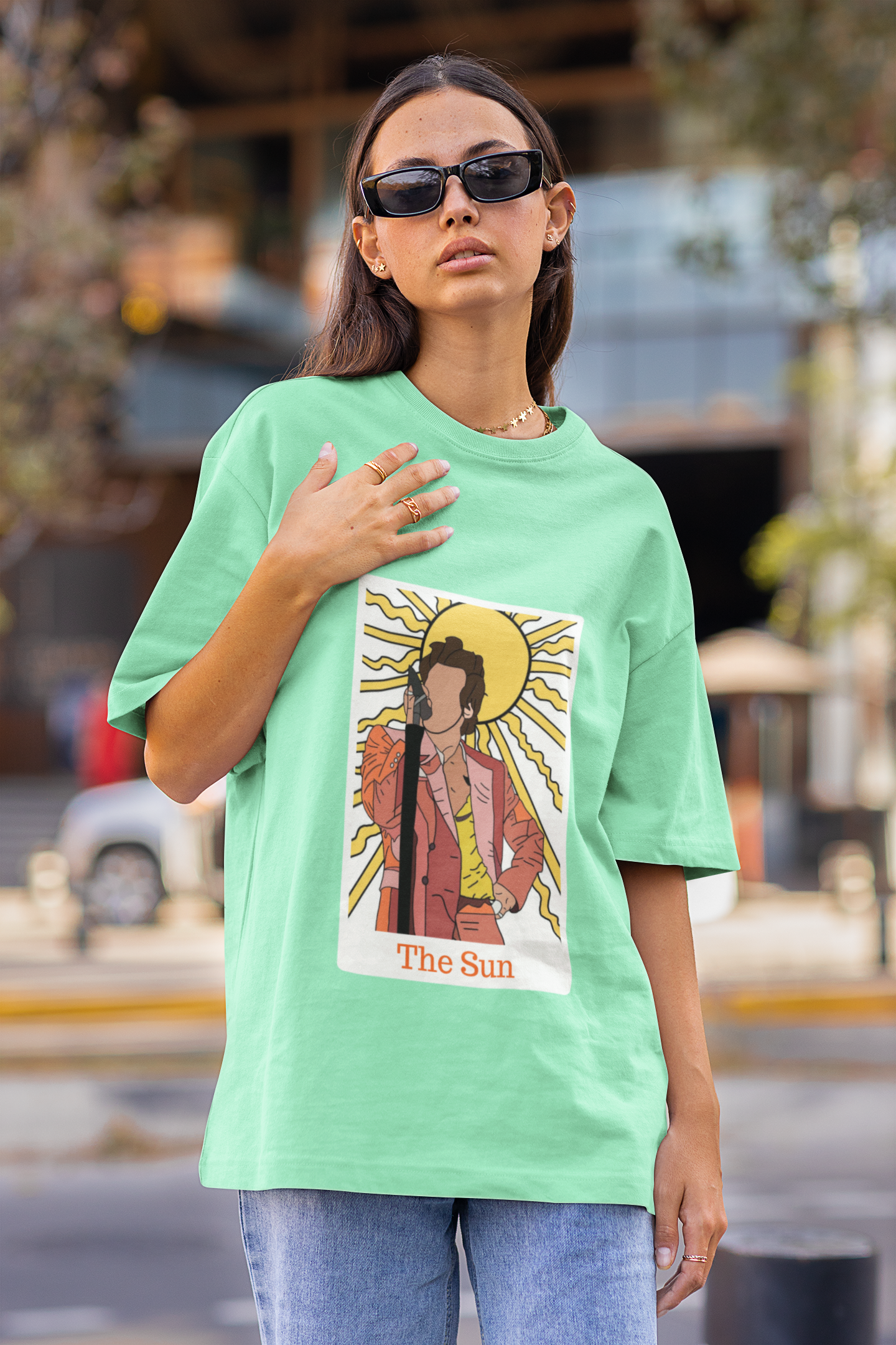 First Image of woman wearing mint green Oversized t-shirt inspired by 'The Sun' - perfect for fans of Harry Styles and One Direction