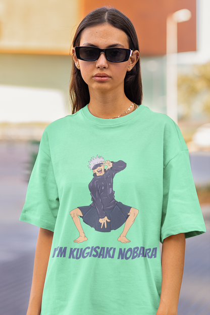 2nd front view of a female model wearing an mint green oversized t-shirt featuring Satoru Gojo dressed as Nobara Kugisaki.