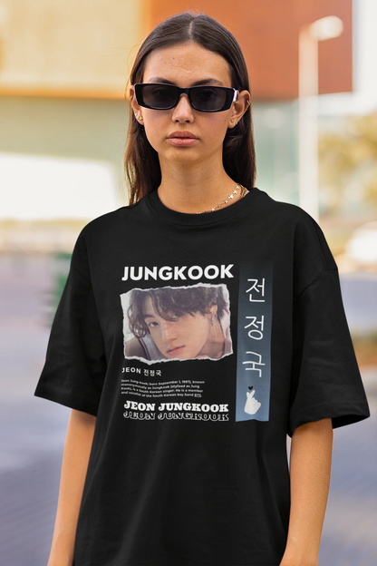 Closeup view of a female model wearing a black oversized t-shirt featuring a vibrant design inspired by BTS member Jungkook. Ideal for fans of BTS and K-Pop music in general.
