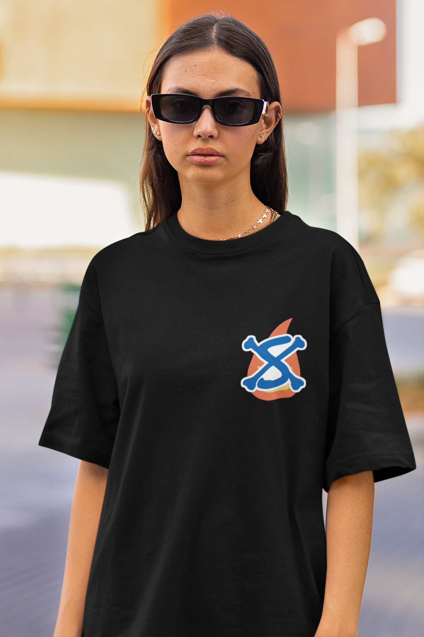 3rd front view of a female model wearing a black oversized t-shirt featuring Sabo with the text "Flame Emperor."