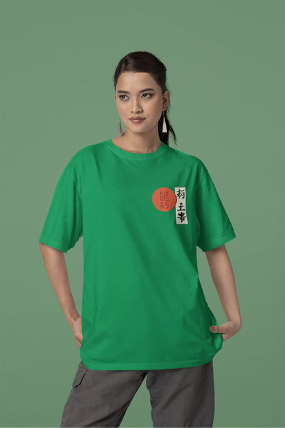 Front view of a male model wearing a forest green oversized tee with a design of a wolf surveying a Japanese landscape.