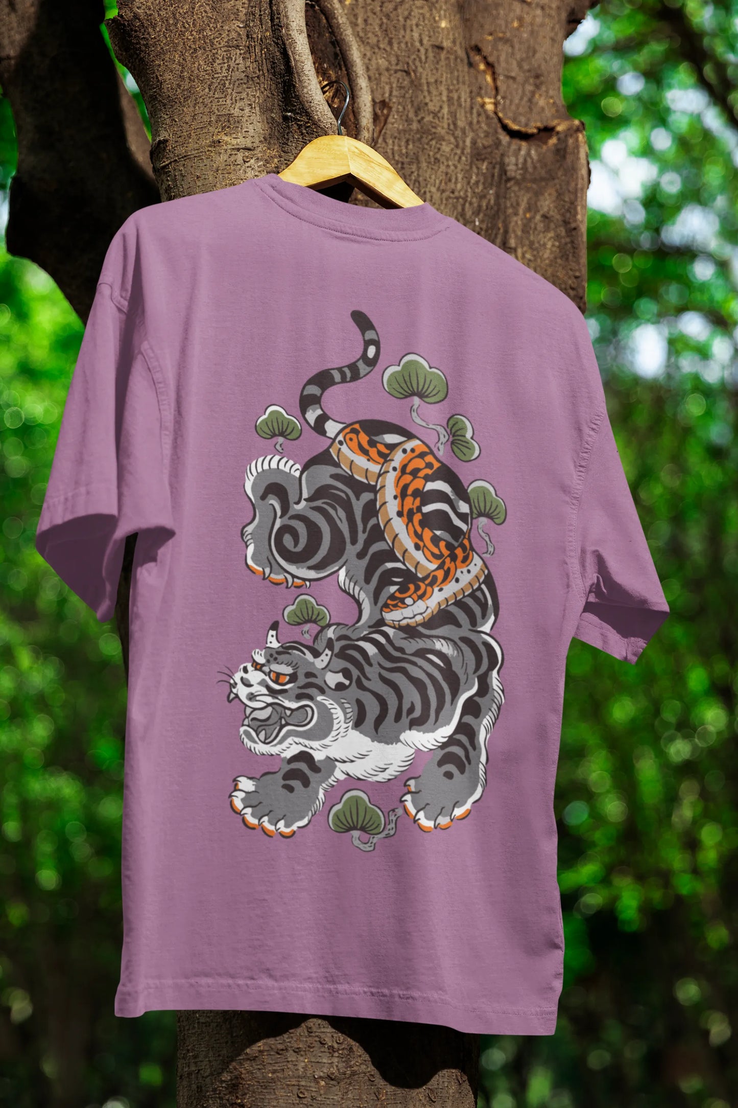 Back view of a dirty purple oversized tee with a Japanese art style tiger design.