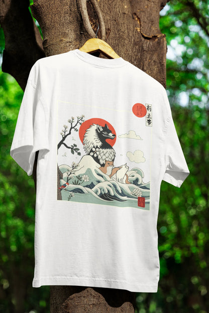 Back view of a off-white oversized tee with a design of a wolf surveying a Japanese landscape.