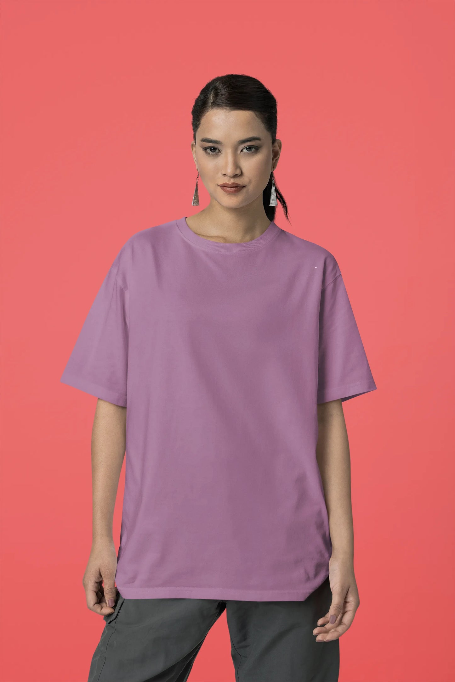 Front view of a female model wearing a dirty purple oversized tee with a Japanese art style tiger design.