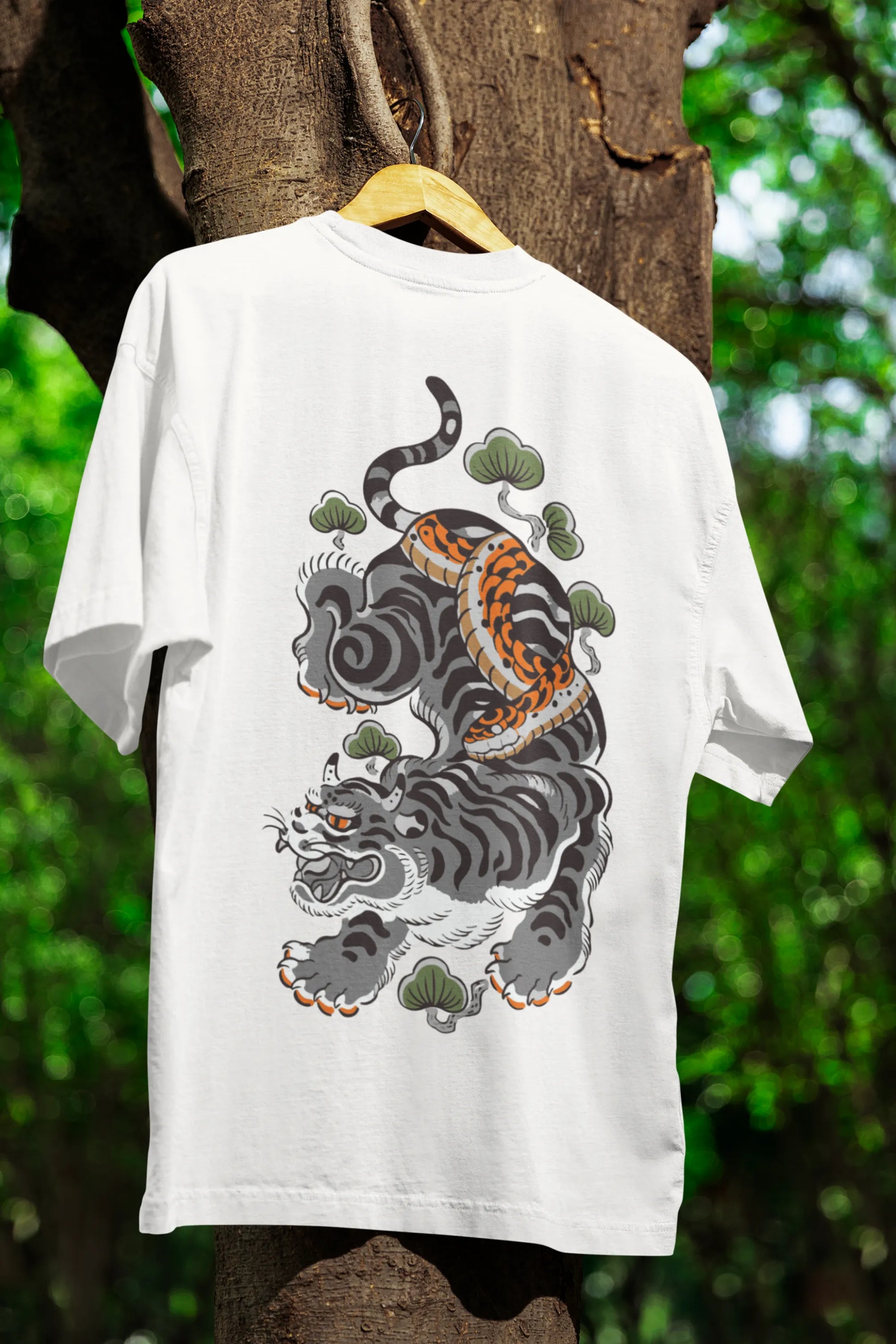 Back view of a off-white oversized tee with a Japanese art style tiger design.