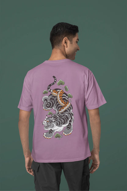 Back view of a male model wearing a dirty purple oversized tee with a Japanese art style tiger design.