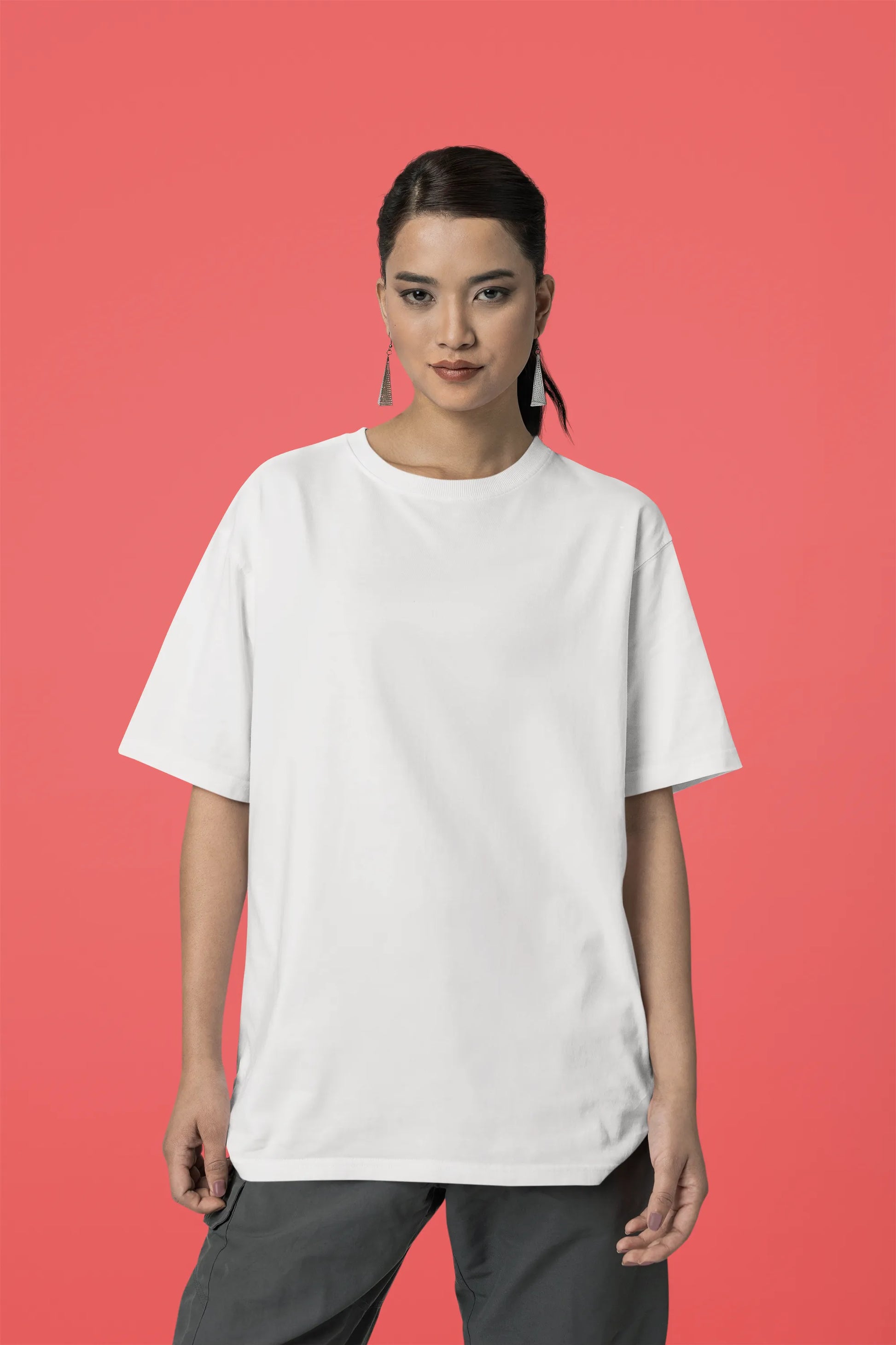 Front view of a male model wearing a off-white oversized tee with a Japanese art style tiger design.