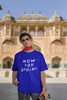 Third image of male model wearing blue oversized t-shirt with F.R.I.E.N.D.S series inspired designs, embodying Joey's famous catchphrase 'How You Doin'?