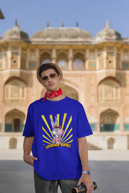 Third image of male Model showcasing blue Bugs Bunny oversize t-shirt from Looney Tunes, featuring a bold Bugs Bunny design