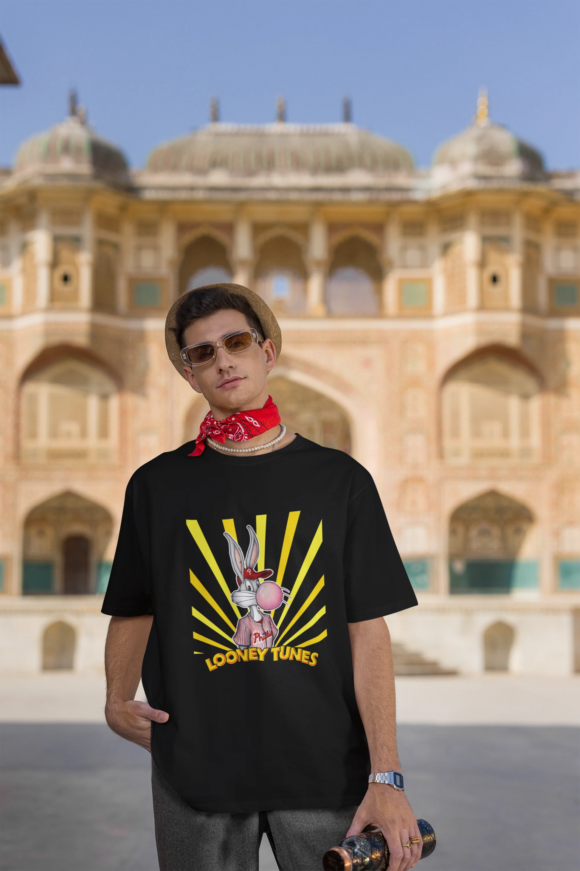 Third image of male Model showcasing black Bugs Bunny oversize t-shirt from Looney Tunes, featuring a bold Bugs Bunny design
