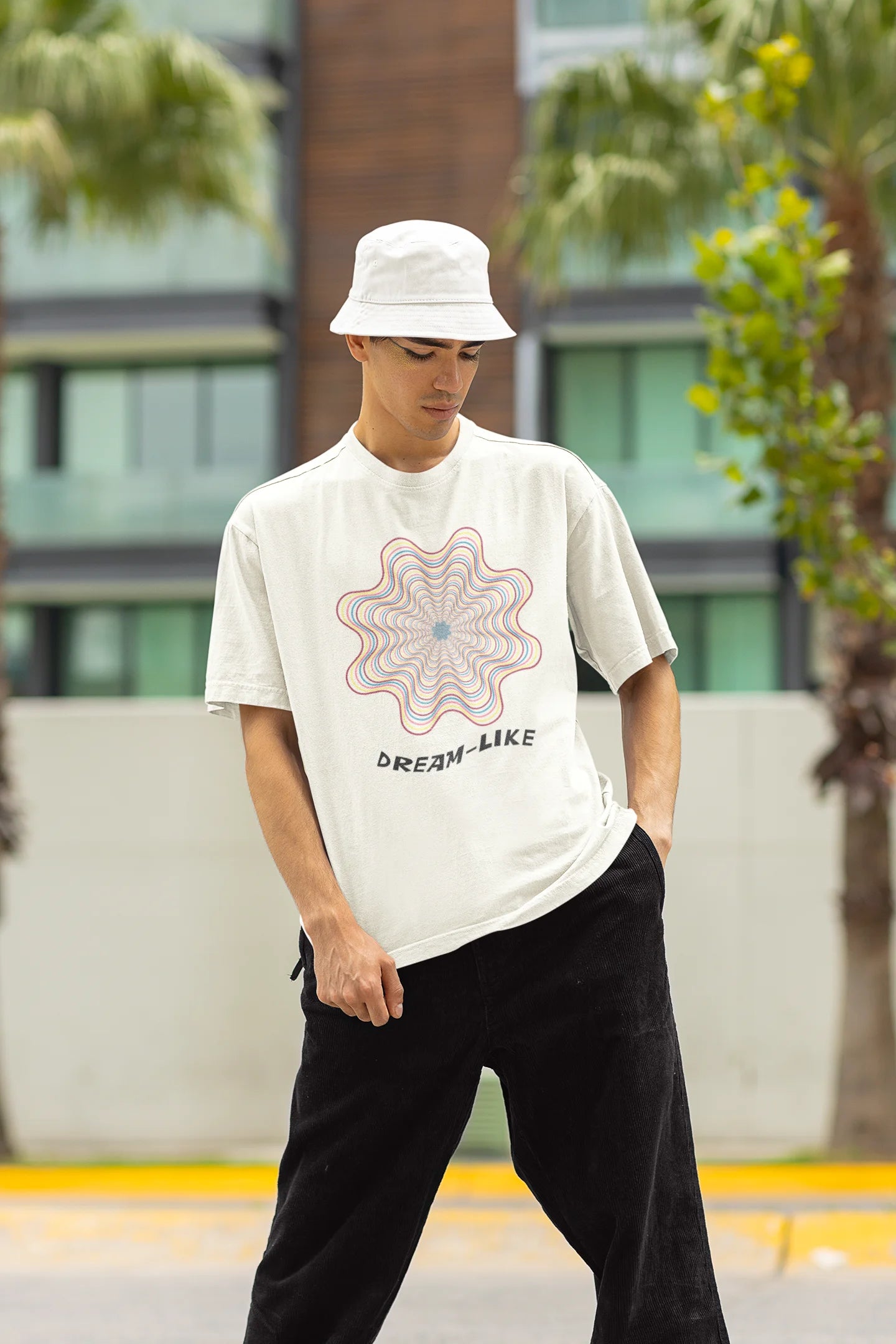 Front view of male model wearing an off-white Oversized t-shirt with a dreamlike spiderweb design made of frequencies, offering a visually captivating and relaxing aesthetic.