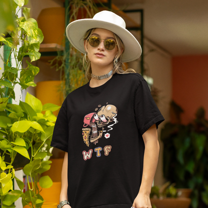 Front view of a female model wearing an black oversized t-shirt featuring a skull enjoying coffee, pizza, and smoking, offering a unique and edgy aesthetic.