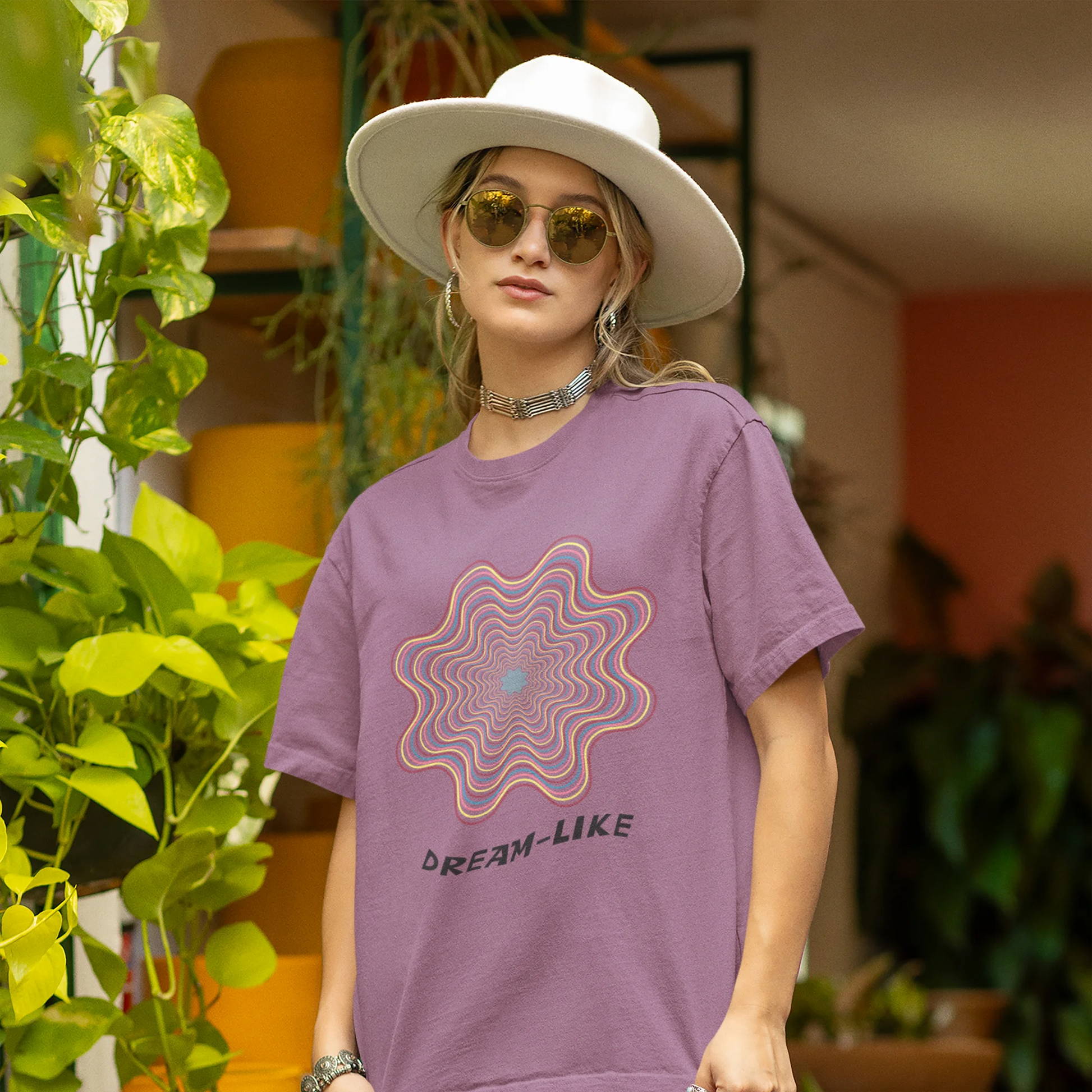 Front view of a female model wearing an dirty purple oversized t-shirt with a dreamlike spiderweb design made of frequencies, offering a visually captivating and relaxing aesthetic.